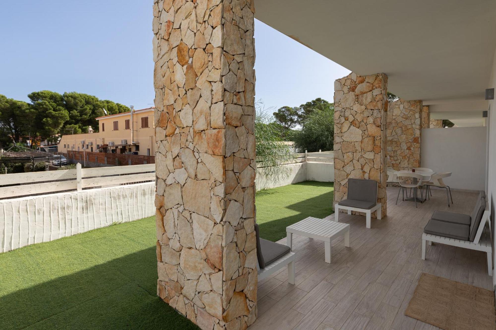 Case Vacanze "Bianco Mare" Porto Pino Ngoại thất bức ảnh