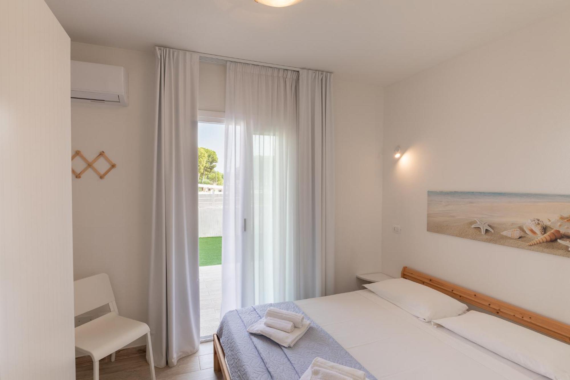 Case Vacanze "Bianco Mare" Porto Pino Phòng bức ảnh