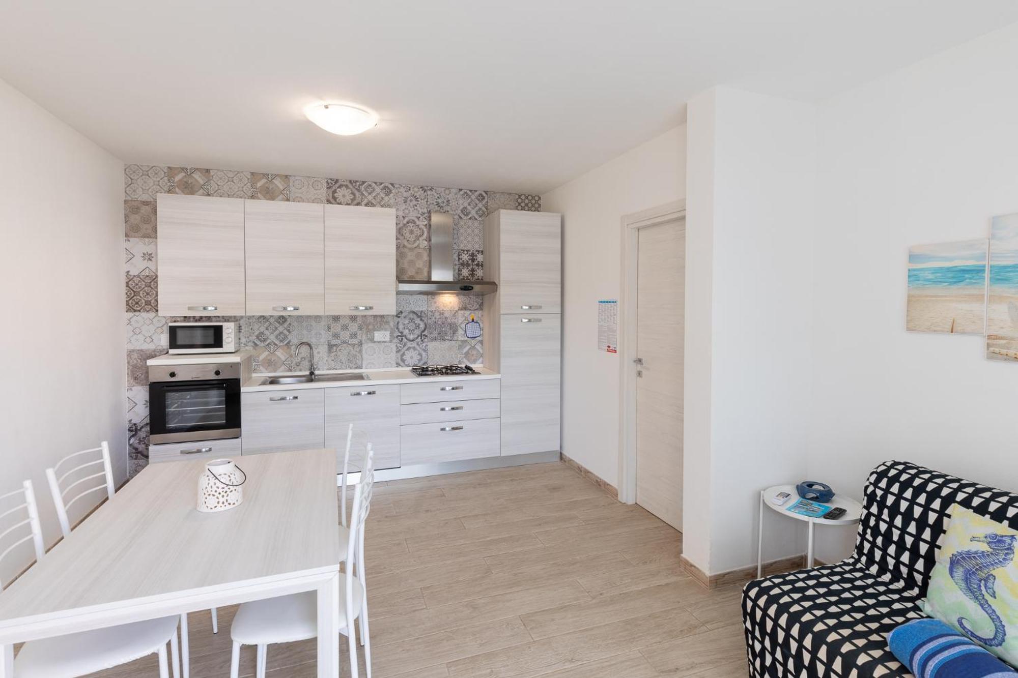 Case Vacanze "Bianco Mare" Porto Pino Ngoại thất bức ảnh