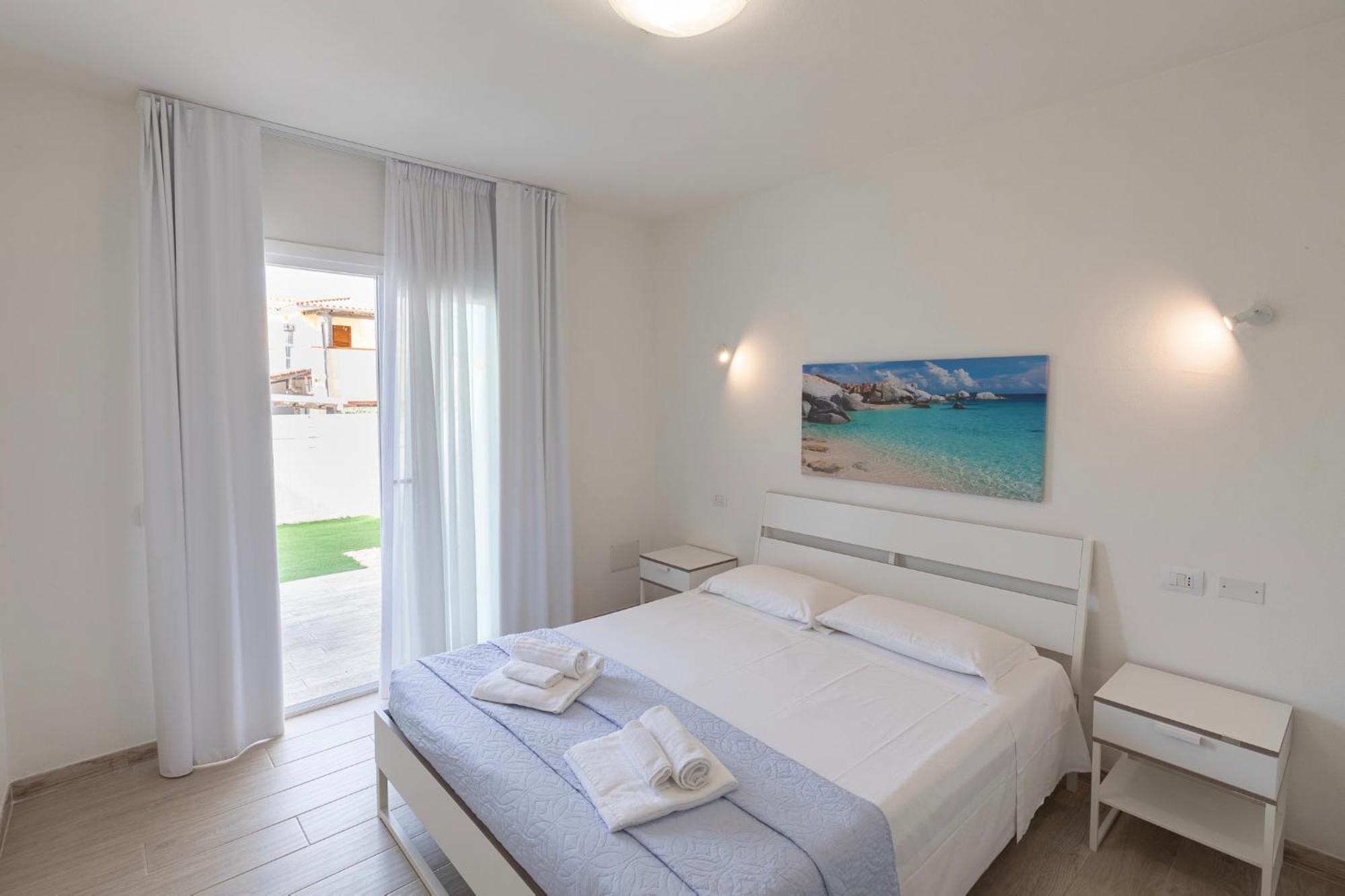 Case Vacanze "Bianco Mare" Porto Pino Ngoại thất bức ảnh