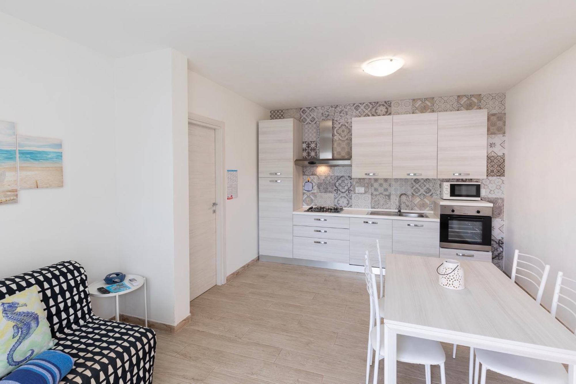 Case Vacanze "Bianco Mare" Porto Pino Phòng bức ảnh