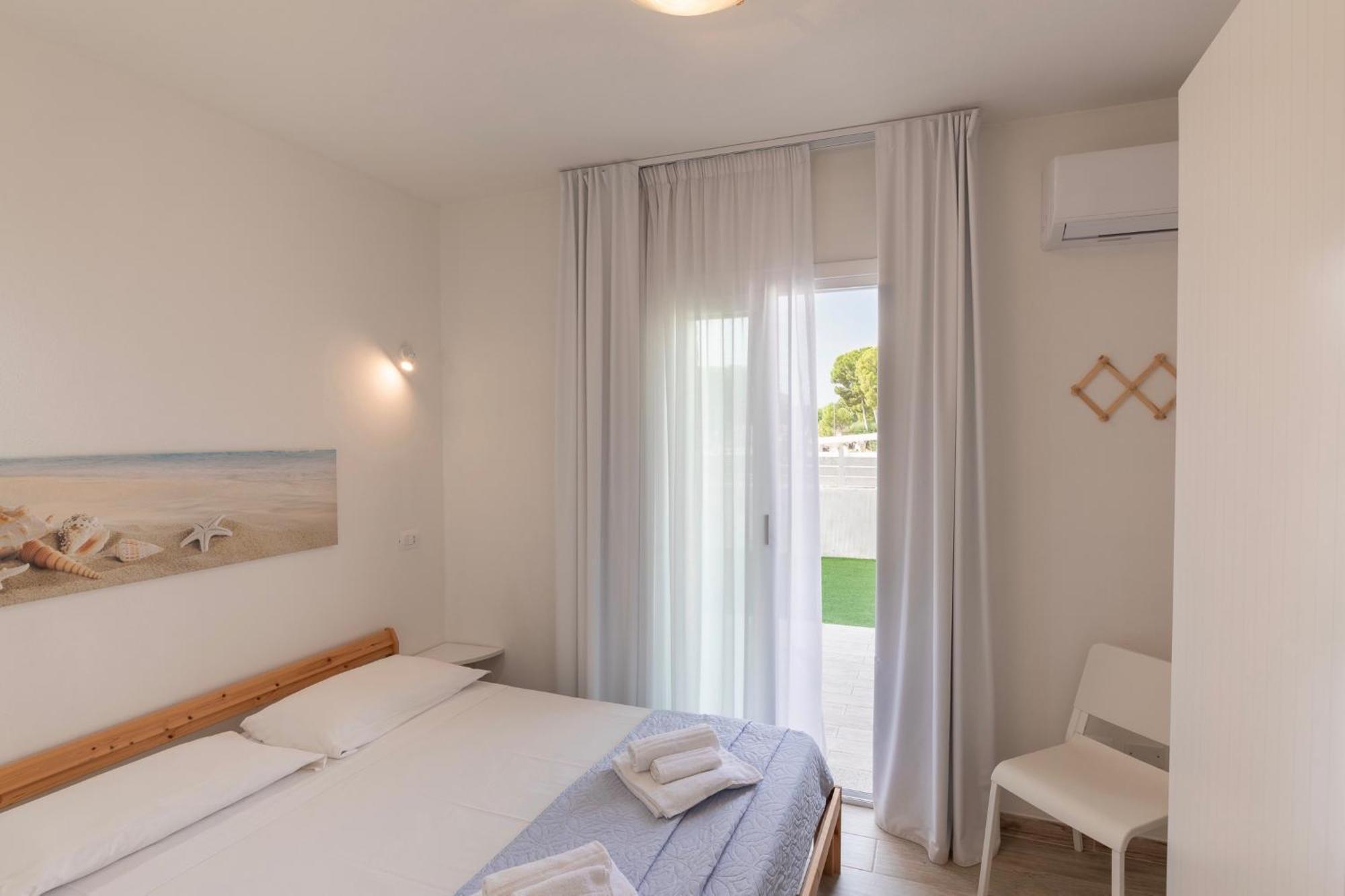 Case Vacanze "Bianco Mare" Porto Pino Phòng bức ảnh