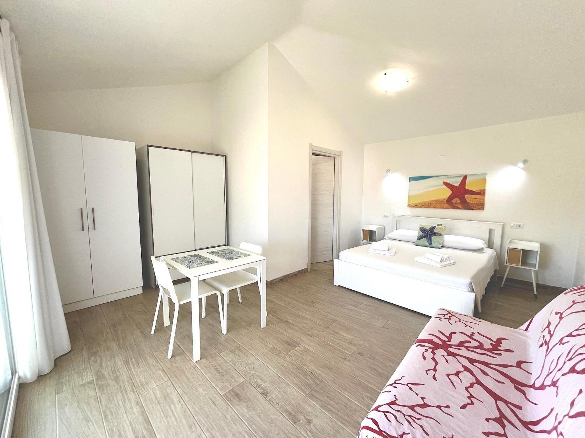Case Vacanze "Bianco Mare" Porto Pino Ngoại thất bức ảnh