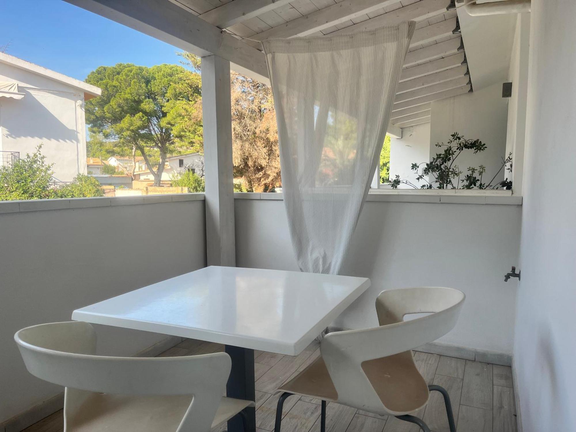 Case Vacanze "Bianco Mare" Porto Pino Ngoại thất bức ảnh